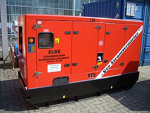 Roter Stromgenerator mit schwarzem Boden